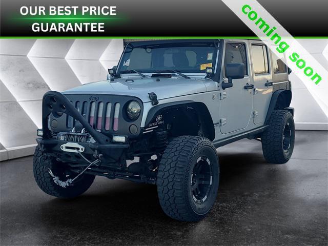 used 2012 Jeep Wrangler Unlimited car, priced at $16,977