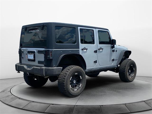used 2012 Jeep Wrangler Unlimited car, priced at $17,477