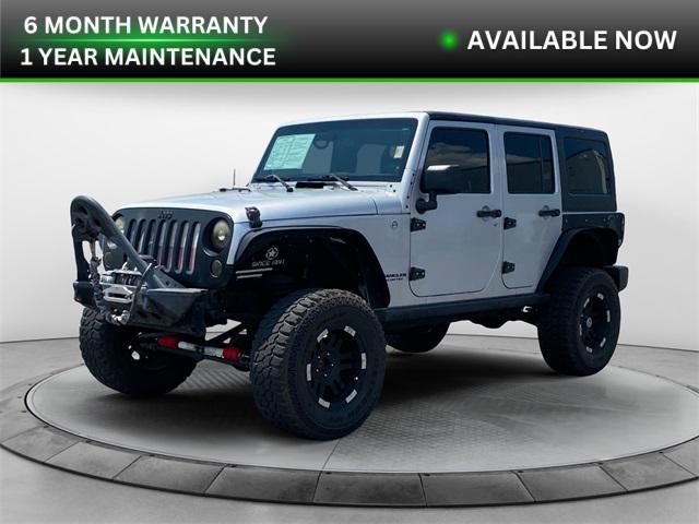 used 2012 Jeep Wrangler Unlimited car, priced at $17,477