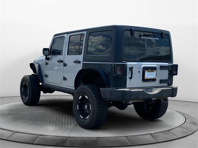 used 2012 Jeep Wrangler Unlimited car, priced at $17,477