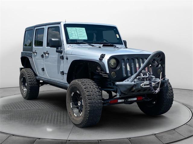 used 2012 Jeep Wrangler Unlimited car, priced at $17,477