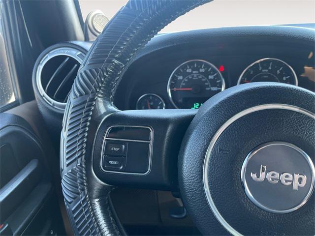 used 2014 Jeep Wrangler Unlimited car, priced at $17,877