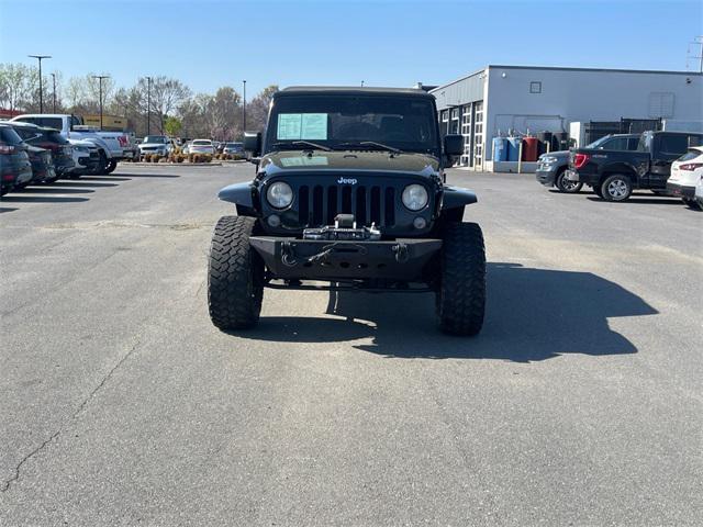 used 2014 Jeep Wrangler Unlimited car, priced at $17,877