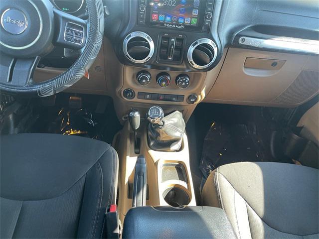 used 2014 Jeep Wrangler Unlimited car, priced at $17,877