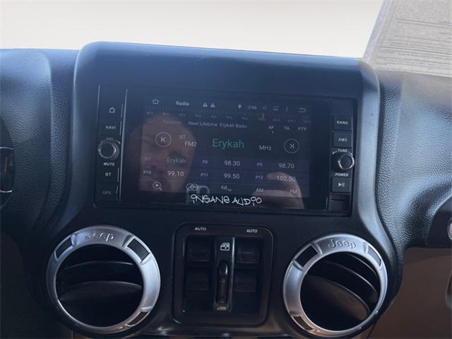 used 2014 Jeep Wrangler Unlimited car, priced at $17,877