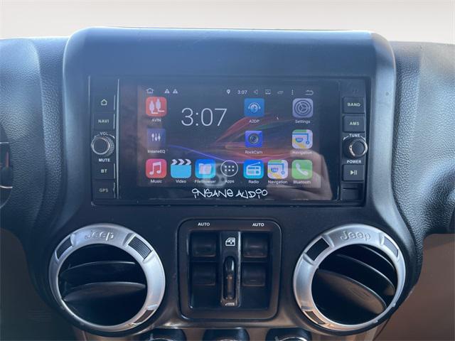used 2014 Jeep Wrangler Unlimited car, priced at $17,877