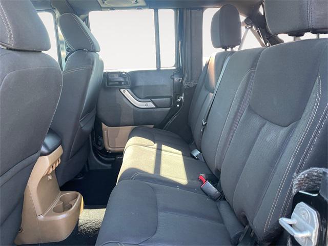used 2014 Jeep Wrangler Unlimited car, priced at $17,877