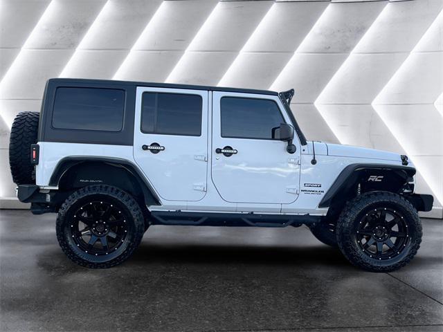 used 2016 Jeep Wrangler Unlimited car, priced at $22,977