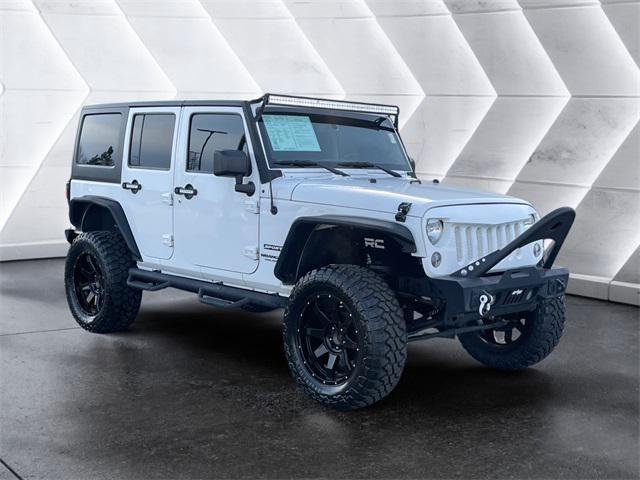 used 2016 Jeep Wrangler Unlimited car, priced at $22,977