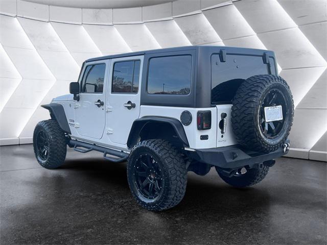 used 2016 Jeep Wrangler Unlimited car, priced at $22,977