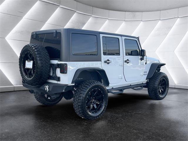 used 2016 Jeep Wrangler Unlimited car, priced at $22,977