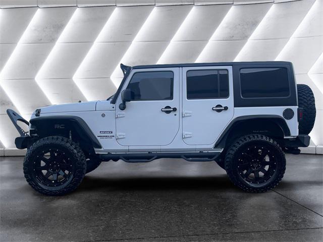 used 2016 Jeep Wrangler Unlimited car, priced at $22,977