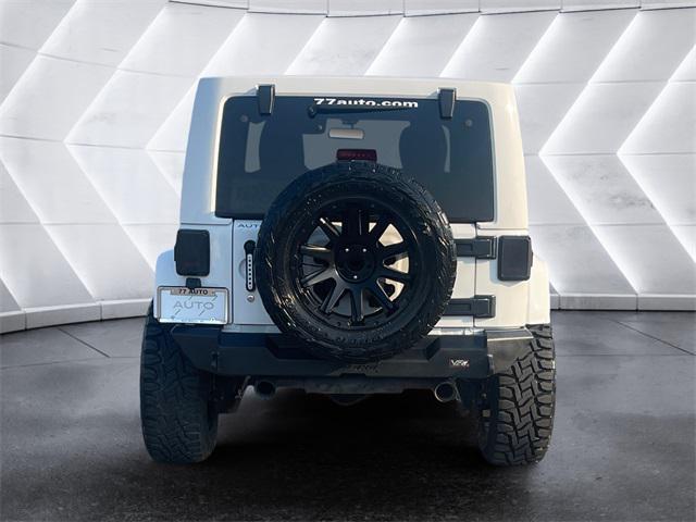 used 2015 Jeep Wrangler Unlimited car, priced at $23,977