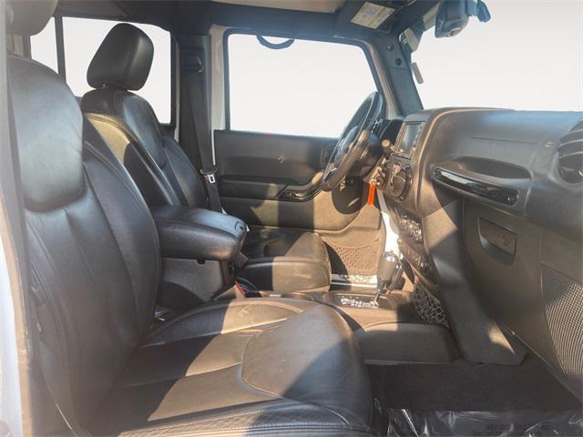 used 2015 Jeep Wrangler Unlimited car, priced at $23,977