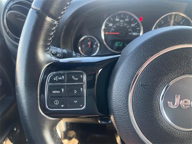used 2015 Jeep Wrangler Unlimited car, priced at $23,977