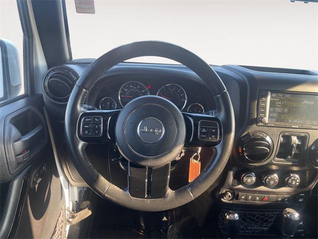 used 2015 Jeep Wrangler Unlimited car, priced at $23,977