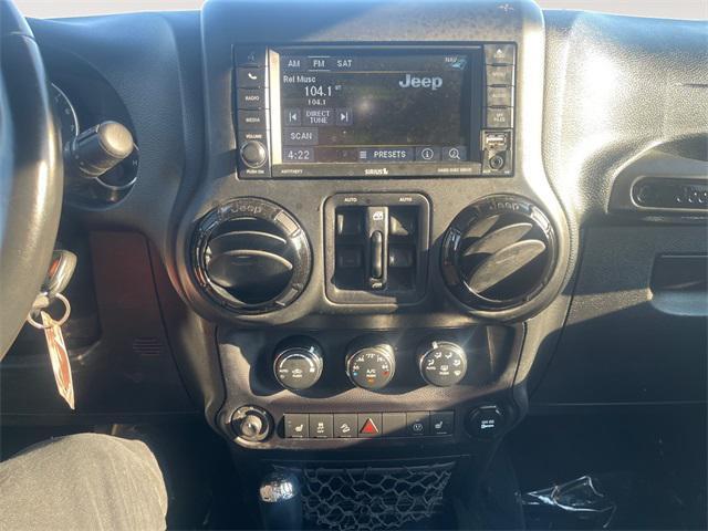 used 2015 Jeep Wrangler Unlimited car, priced at $23,977