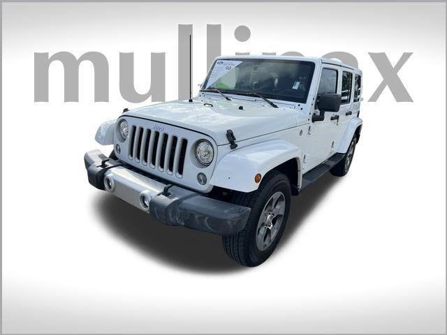 used 2018 Jeep Wrangler JK Unlimited car, priced at $23,901