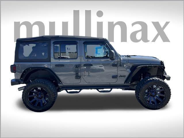 used 2021 Jeep Wrangler Unlimited car, priced at $25,901