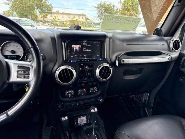 used 2013 Jeep Wrangler Unlimited car, priced at $13,900