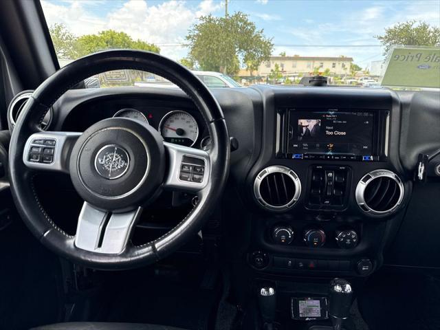 used 2013 Jeep Wrangler Unlimited car, priced at $13,900