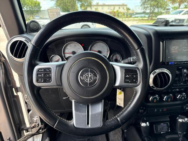 used 2013 Jeep Wrangler Unlimited car, priced at $13,900