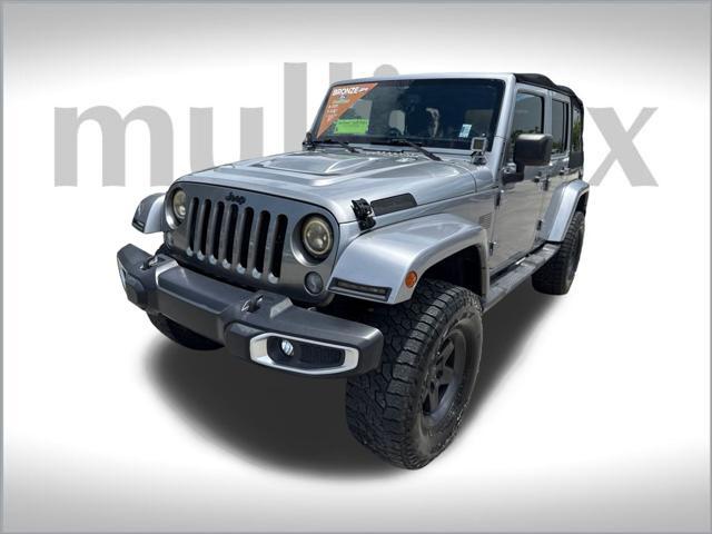 used 2013 Jeep Wrangler Unlimited car, priced at $13,900