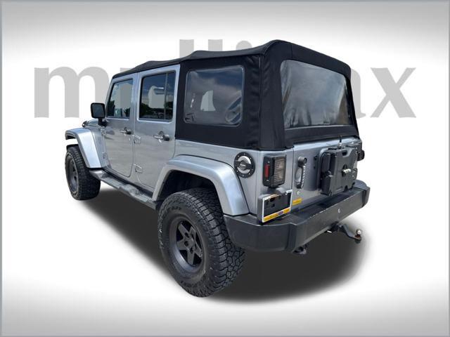 used 2013 Jeep Wrangler Unlimited car, priced at $13,900