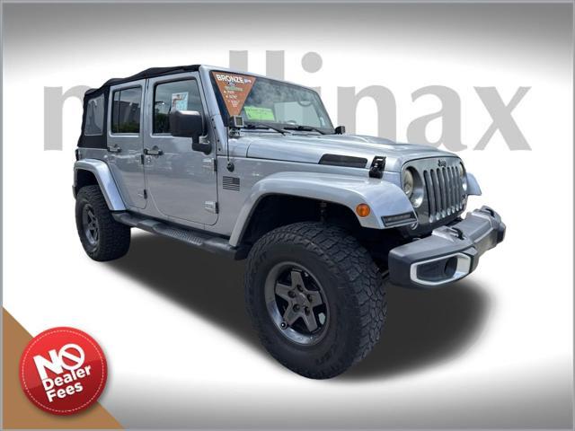used 2013 Jeep Wrangler Unlimited car, priced at $13,900