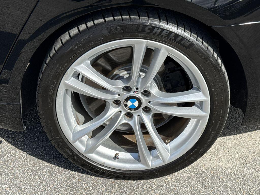 used 2013 BMW 750 car, priced at $14,901
