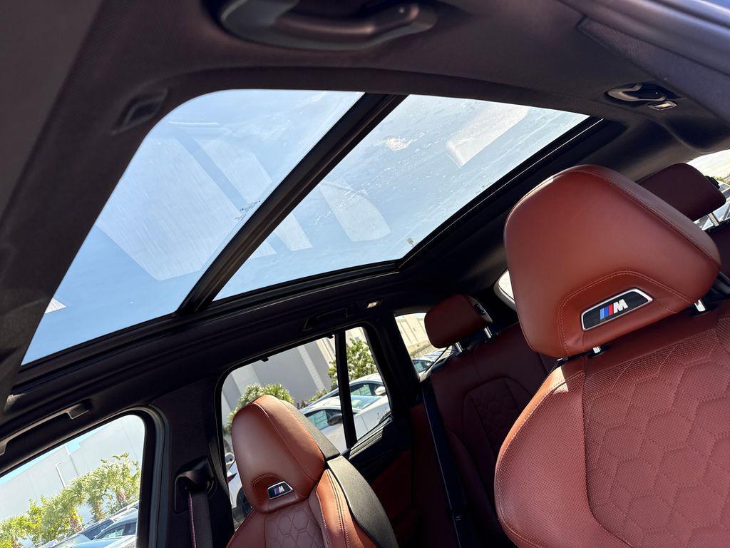 used 2021 BMW X3 M car, priced at $49,900