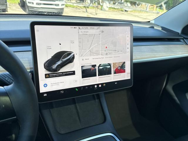 used 2024 Tesla Model Y car, priced at $34,900