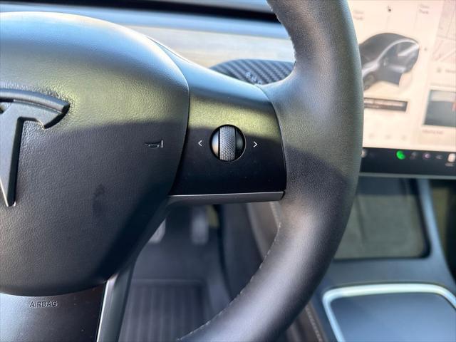 used 2024 Tesla Model Y car, priced at $34,900