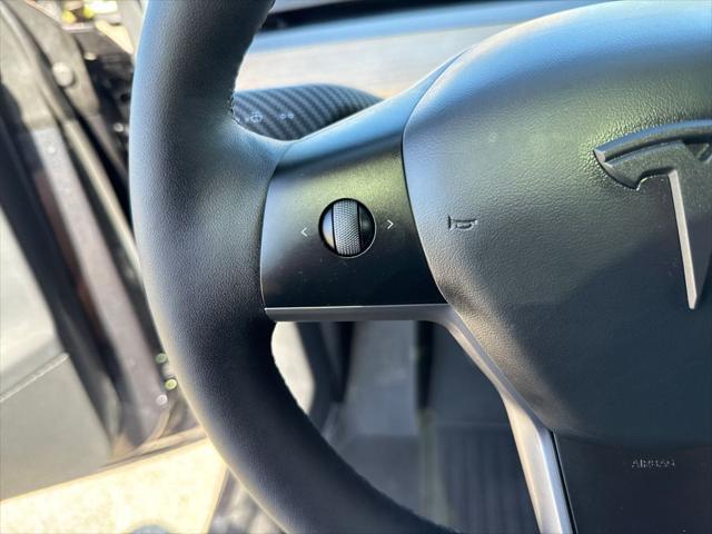 used 2024 Tesla Model Y car, priced at $34,900