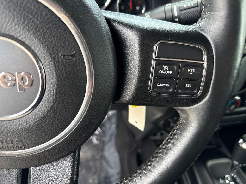 used 2015 Jeep Wrangler Unlimited car, priced at $16,901
