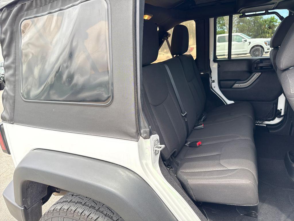 used 2015 Jeep Wrangler Unlimited car, priced at $16,901
