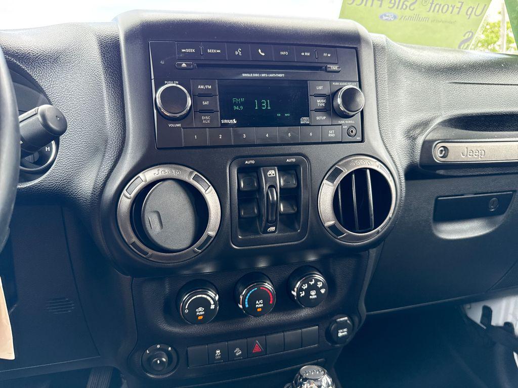 used 2015 Jeep Wrangler Unlimited car, priced at $16,901
