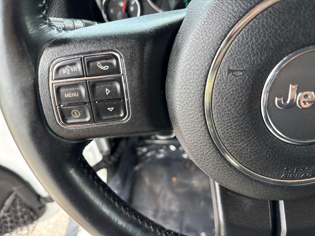 used 2015 Jeep Wrangler Unlimited car, priced at $16,901