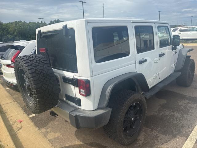 used 2015 Jeep Wrangler Unlimited car, priced at $18,997