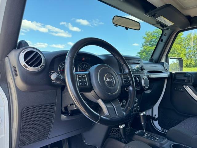 used 2012 Jeep Wrangler Unlimited car, priced at $11,900