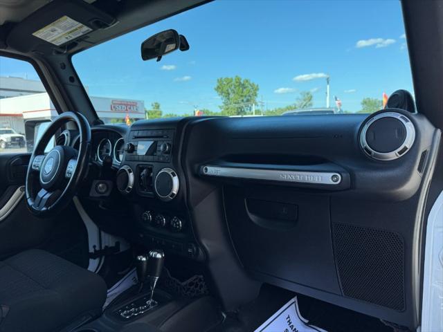 used 2012 Jeep Wrangler Unlimited car, priced at $11,900