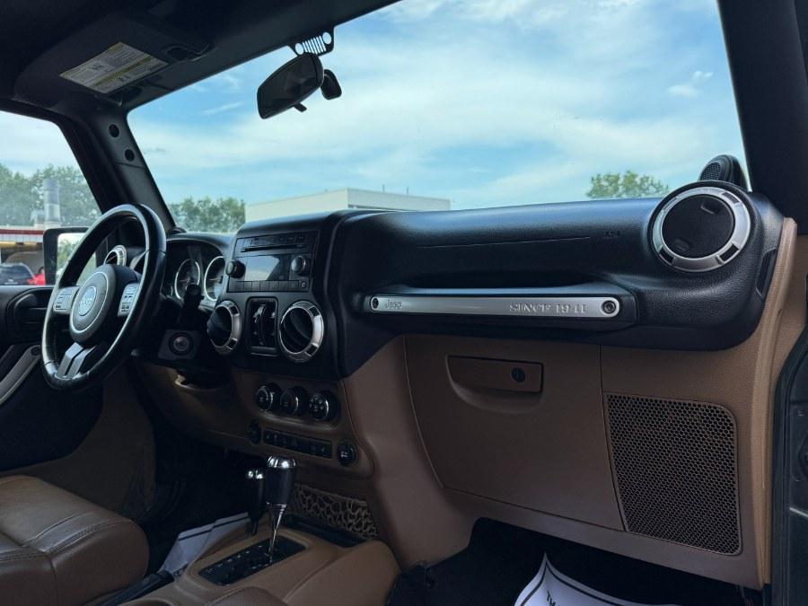 used 2011 Jeep Wrangler Unlimited car, priced at $8,900
