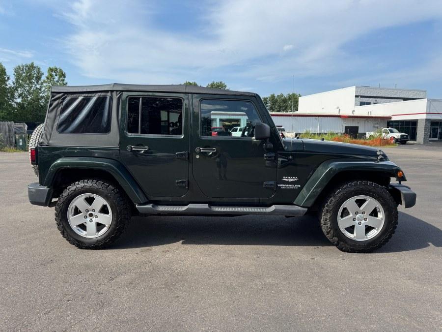 used 2011 Jeep Wrangler Unlimited car, priced at $8,900