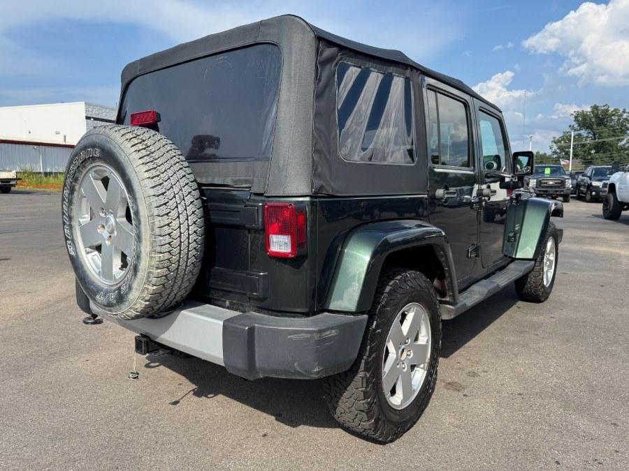 used 2011 Jeep Wrangler Unlimited car, priced at $8,900