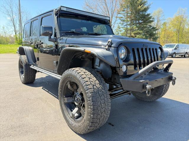 used 2015 Jeep Wrangler Unlimited car, priced at $16,900