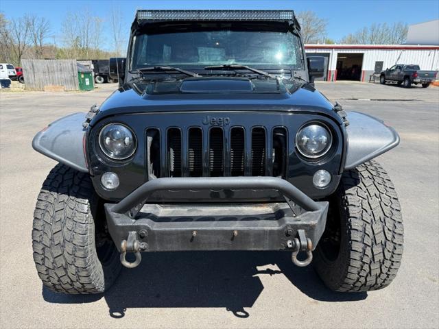 used 2015 Jeep Wrangler Unlimited car, priced at $16,900