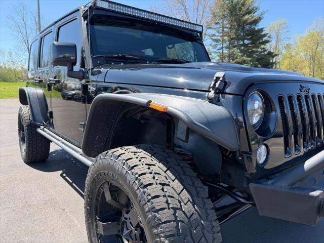 used 2015 Jeep Wrangler Unlimited car, priced at $16,900