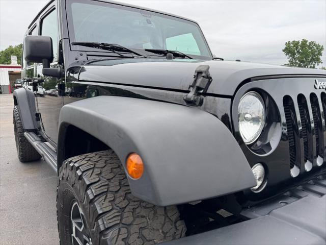 used 2018 Jeep Wrangler JK Unlimited car, priced at $12,900
