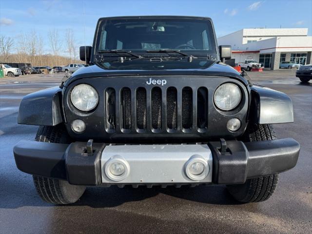 used 2015 Jeep Wrangler Unlimited car, priced at $13,900