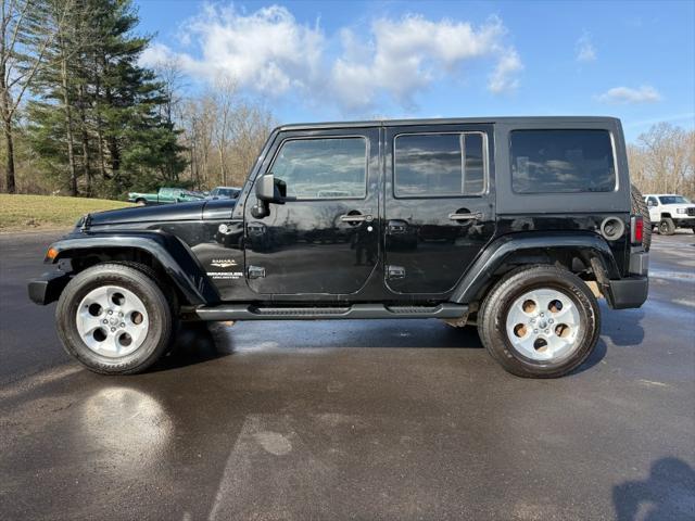 used 2015 Jeep Wrangler Unlimited car, priced at $13,900